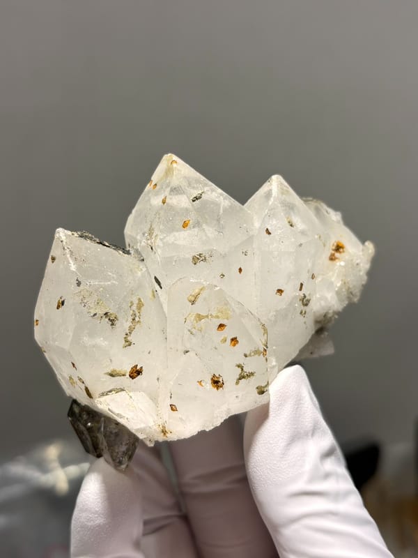 Milky Tibetan quartz cluster with imprint marks from Tibet, China, close-up of the crystal faces
