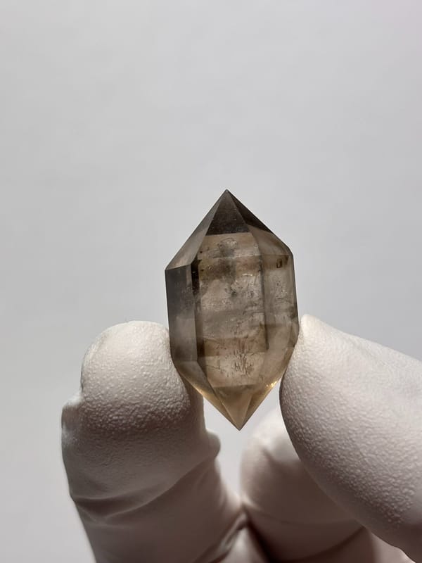Tiny smoky double-terminated quartz with phantom from Yunnan, China, reverse side