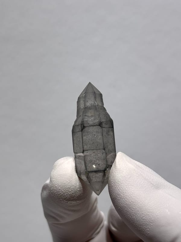 Grey sketch-pattern double-terminated quartz with sceptre tip from Yunnan, China, reverse side