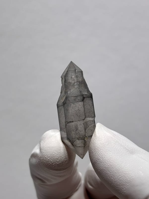 Grey sketch-pattern double-terminated quartz with sceptre tip from Yunnan, China, top view