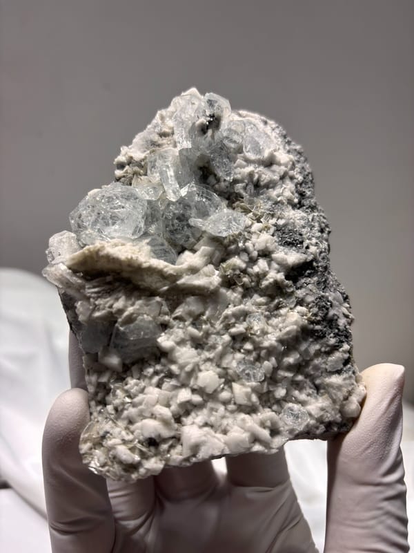 Aquamarine and mica plate from Xuebaoding, Sichuan, China, second angle