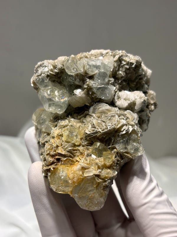 Quartz and aquamarine cluster on golden mica from Xuebaoding, Sichuan, China, second angle