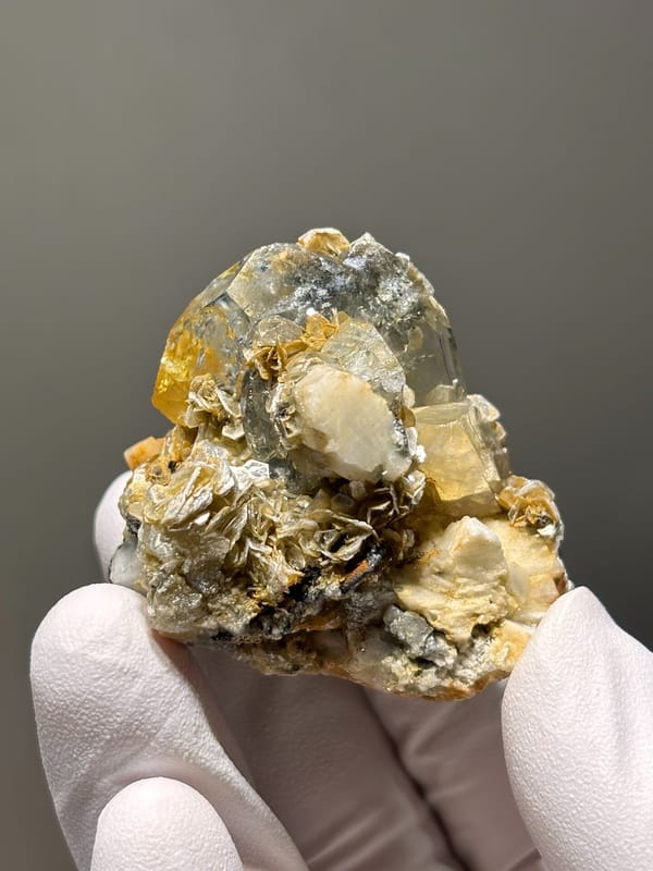 Aquamarine cluster with mica, scheelite and feldspar from Xuebaoding, Sichuan, China, second angle