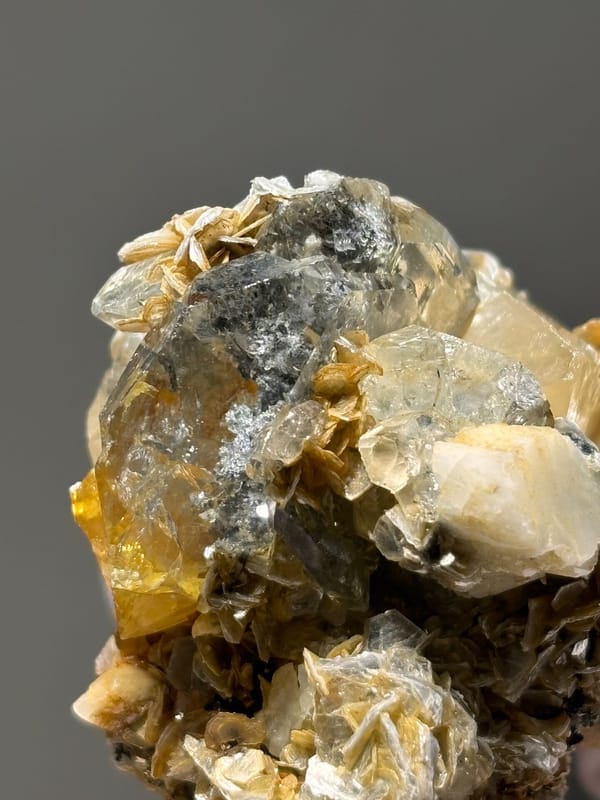 Aquamarine cluster with mica, scheelite and feldspar from Xuebaoding, Sichuan, China, reverse side