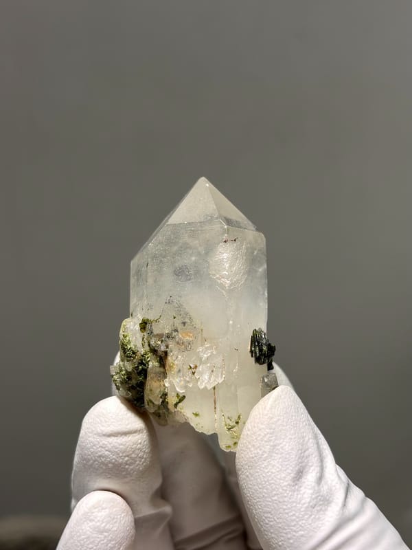 Clear garden quartz point with floater base from Sichuan, China, top view