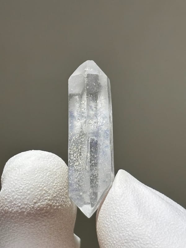 Tiny dumortierite-in-quartz double-terminated crystal from Brazil, second angle