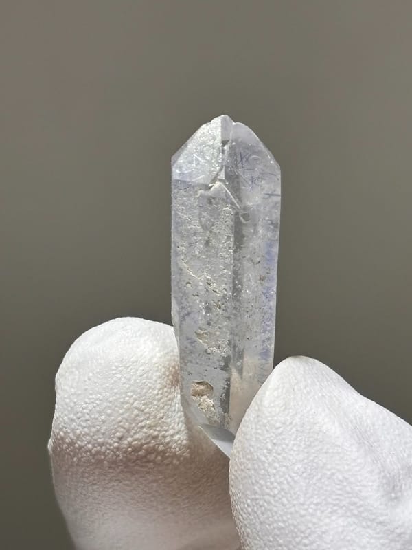 Tiny dumortierite-in-quartz double-terminated crystal from Brazil, reverse side