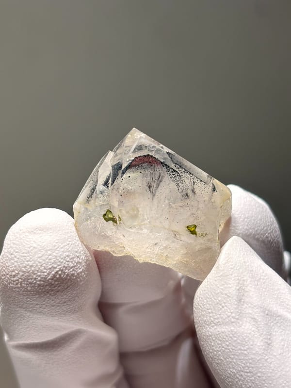 Tiny garden quartz with green epidote specks from Sichuan, China, side view