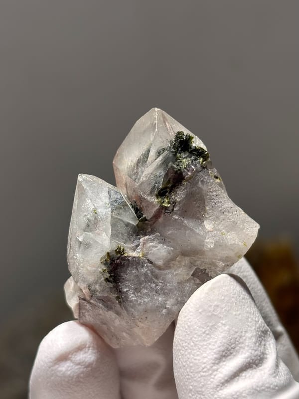 Garden quartz with green chlorite phantoms from Sichuan, China, close-up of the crystal faces