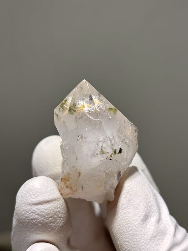 Garden quartz point with green epidote inclusion from Sichuan, China, reverse side