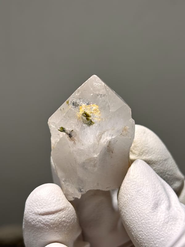 Garden quartz point with green epidote inclusion from Sichuan, China, top view