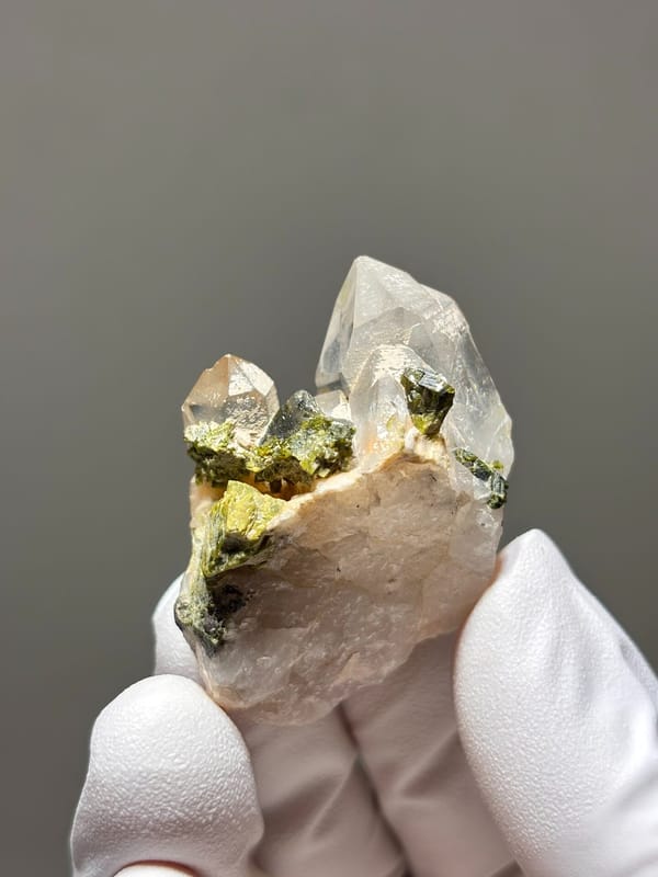 Garden quartz cluster with green and orange inclusions from Sichuan, China, reverse side