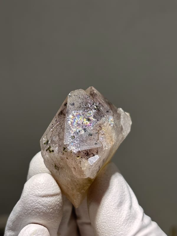 Garden quartz with dark inclusions and rainbow flash from Sichuan, China, second angle