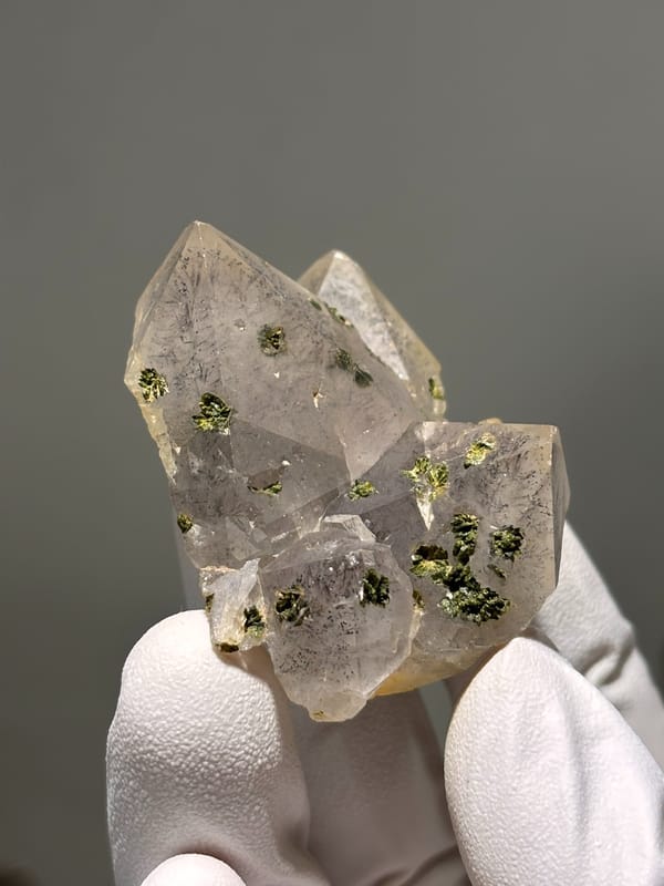 Garden quartz cluster with green epidote specks from Sichuan, China, top view