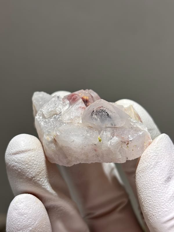 Garden quartz cluster with red and green inclusions from Sichuan, China, reverse side