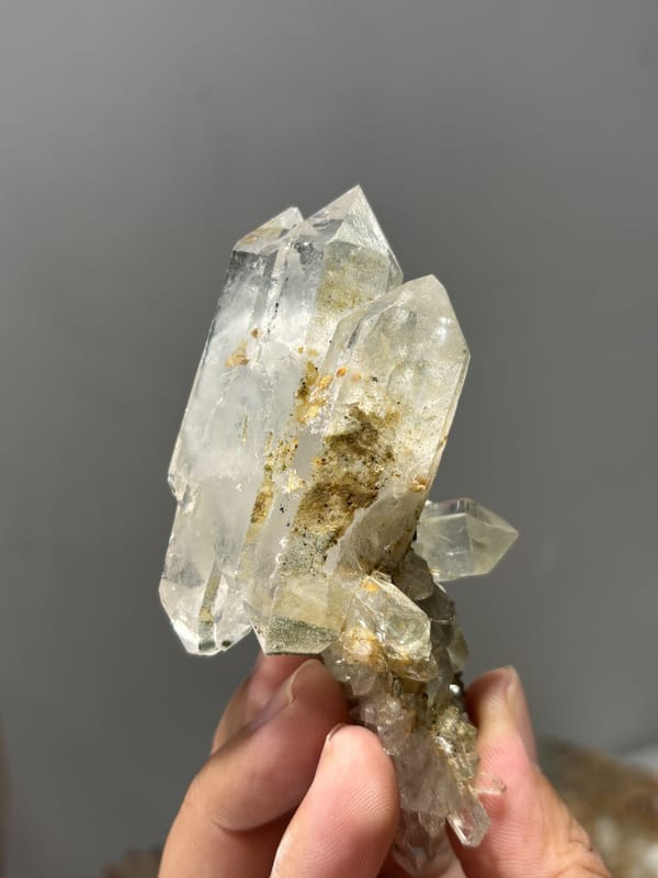 Garden quartz cluster with complete main crystal from Sichuan, China, close-up of the crystal faces