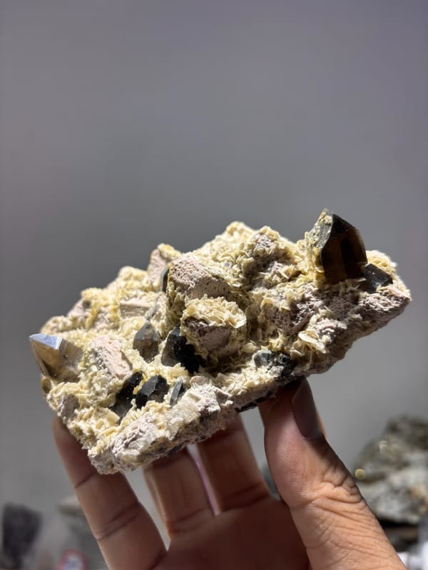 Feldspar plate with smoky quartz and calcite from Fujian, China, second angle