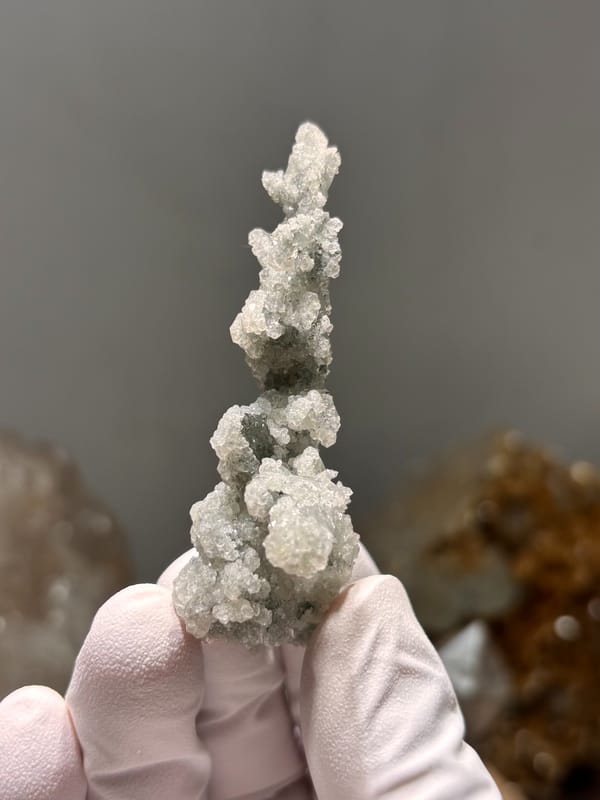 Grey-green botryoidal apophyllite spire over quartz from Hubei, China, second angle