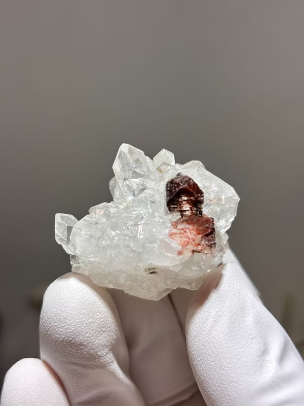 Cluster of clear apophyllite crystals from India, close-up of the crystal faces