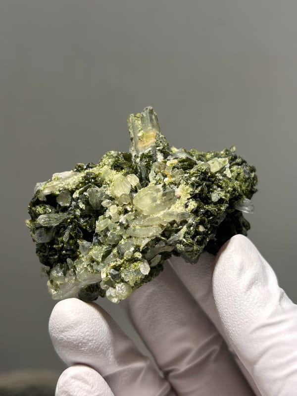 Dark green epidote cluster with white quartz points from Sichuan, China, reverse side