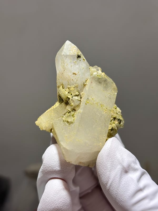 Milky quartz point with green epidote on floater base from Sichuan, China, second angle