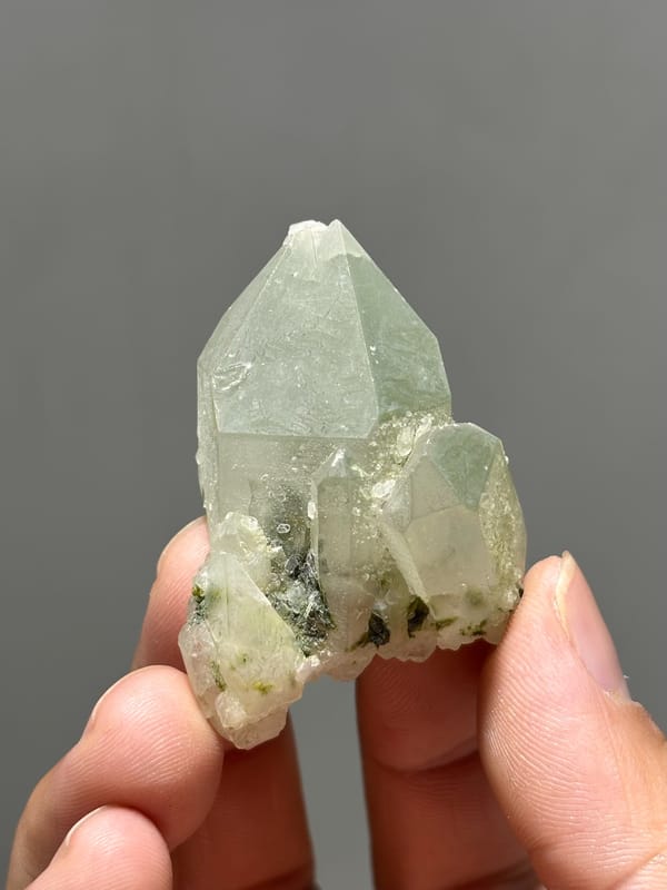 Pale green epidote quartz floater with complete tip from Sichuan, China, second angle
