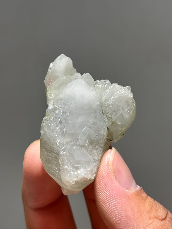 Pale green epidote quartz floater with complete tip from Sichuan, China, reverse side