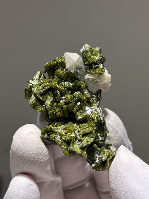 Olive-green epidote cluster with white-capped quartz from Sichuan, China, second angle
