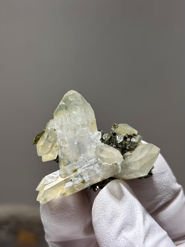Pale green epidote-tinted quartz points from Sichuan, China, reverse side