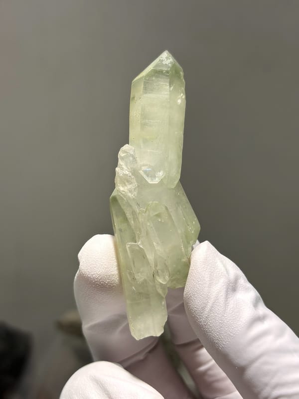Pale green epidote-tinted quartz wand from Sichuan, China, second angle