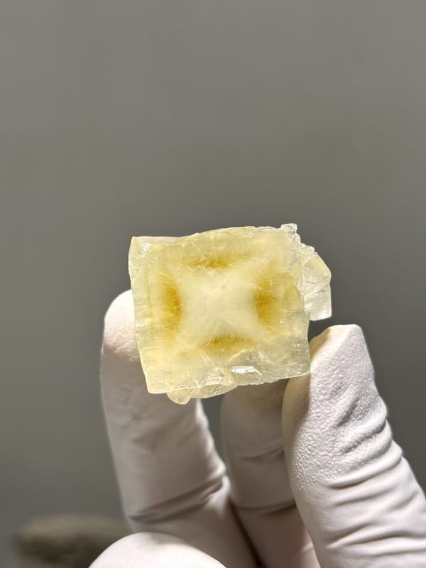 Pale yellow apophyllite cube with hourglass pattern from India, second angle