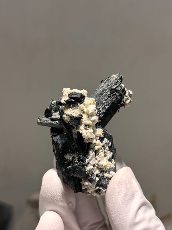 Black schorl prism on white feldspar from Namibia, reverse side