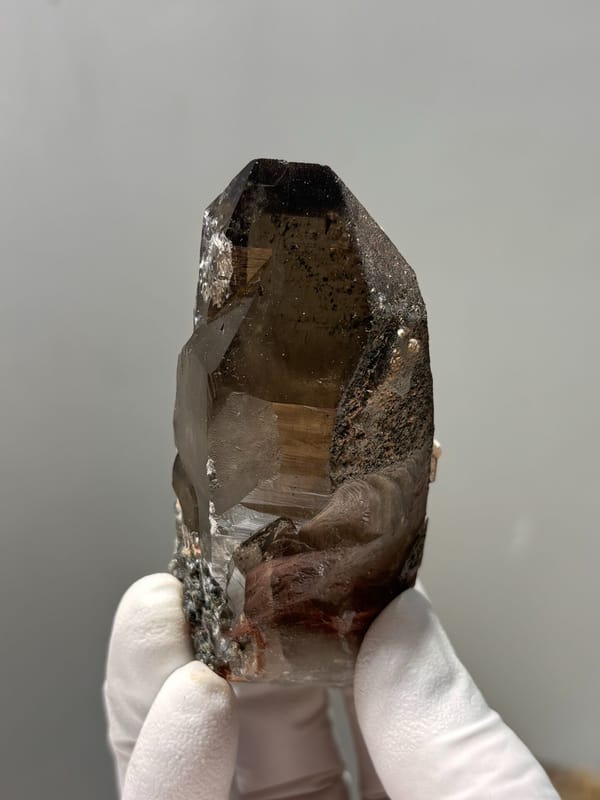Dark smoky quartz point with complete tip from Fujian, China, second angle