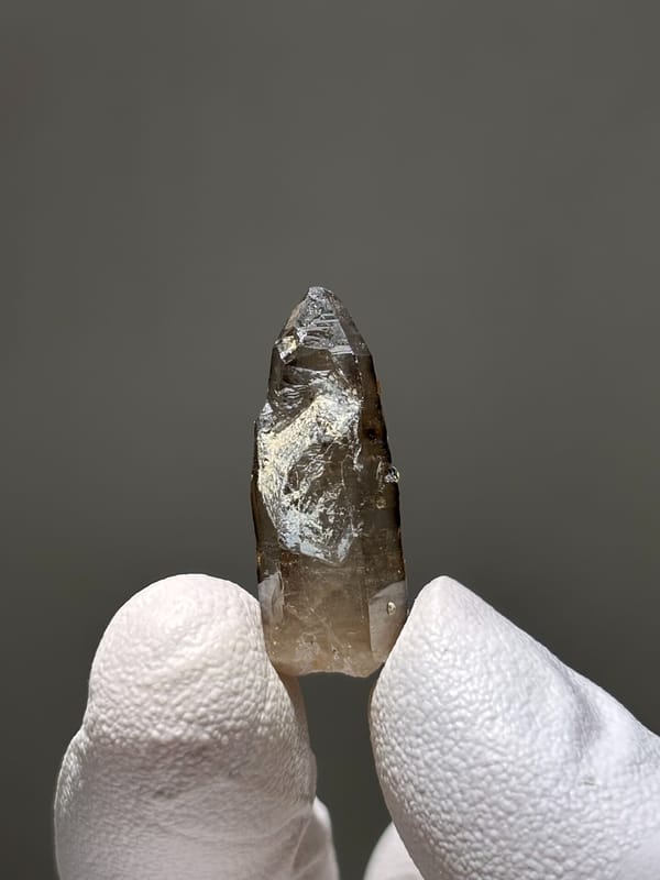 Tiny smoky quartz with Fanta-orange spessartine from Fujian, China, reverse side
