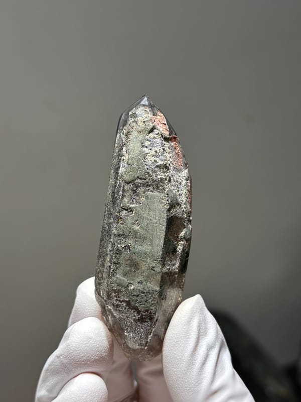 Smoky quartz point with grey phantom from Fujian, China, reverse side