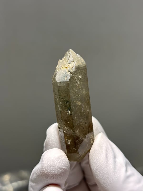 Tea-brown smoky quartz point with milky tip from Sichuan, China, second angle