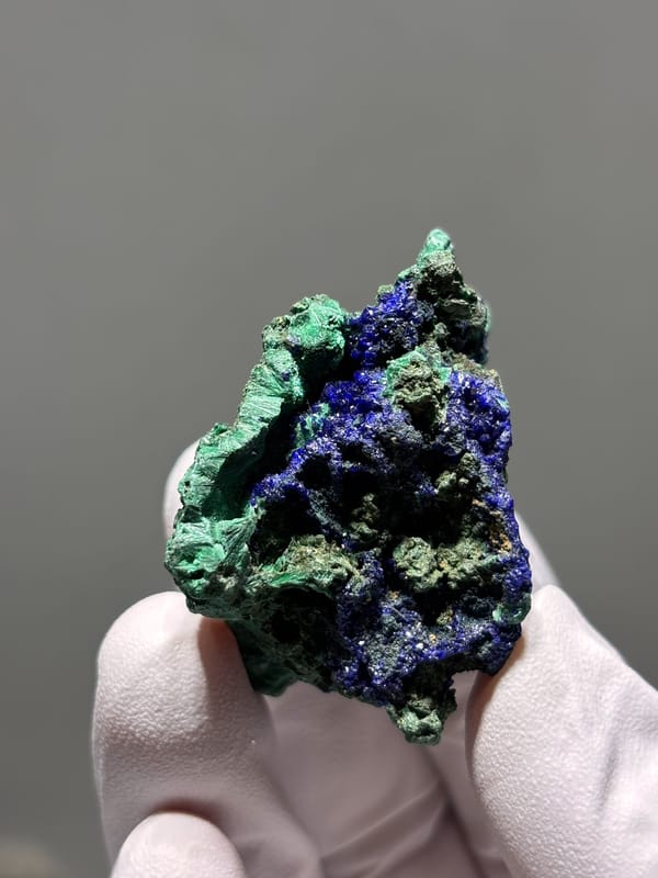 Deep blue azurite crust with green malachite from Hubei, China, reverse side