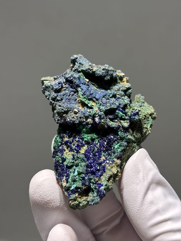 Deep blue azurite plate with green malachite from Hubei, China, close-up of the crystal faces