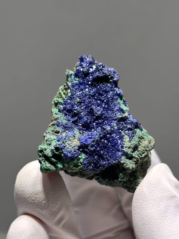 Sparkling azurite crust with green malachite from Hubei, China, second angle