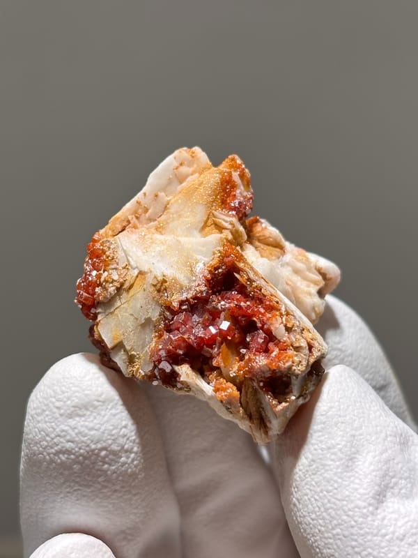 Red vanadinite crystals on white baryte from Morocco, second angle