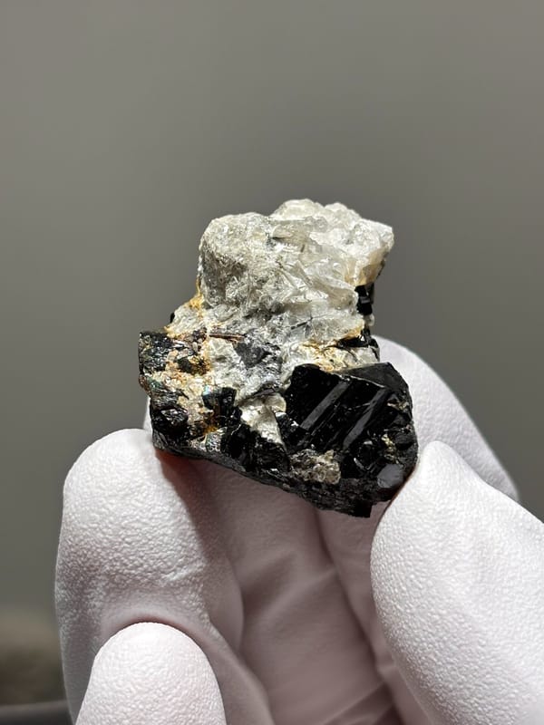 Black cassiterite block with silver mica from Xuebaoding, Sichuan, China, second angle