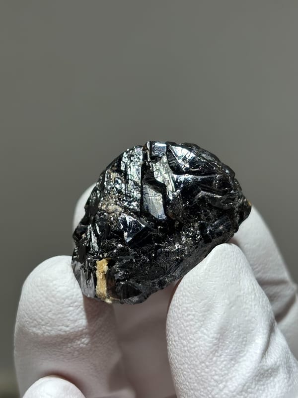 Glossy black cassiterite crystal from Xuebaoding, Sichuan, China, second angle