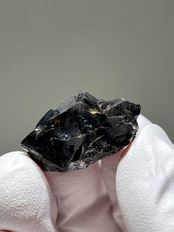 Sharp black cassiterite crystal group from Xuebaoding, Sichuan, China, second angle