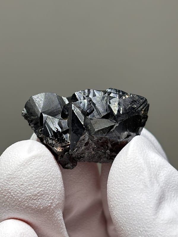 Sharp black cassiterite crystal group from Xuebaoding, Sichuan, China, top view