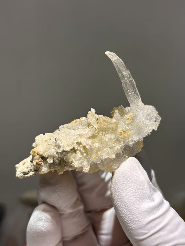 Gypsum crystal bar with rising blade from Guizhou, China, close-up of the crystal faces