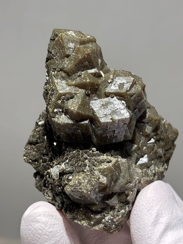 Olive-brown garnet crystal cluster from Inner Mongolia, China, reverse side