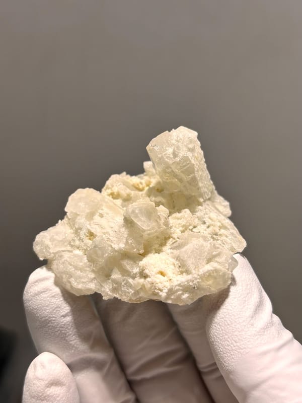 Cluster of cream baryte crystals with rising blade from Sichuan, China, second angle