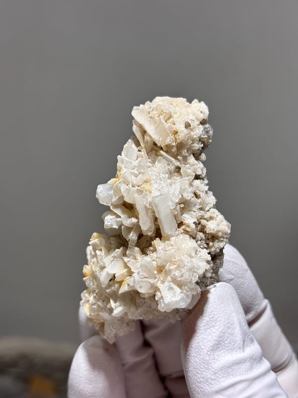 Cluster of cream baryte blades from Sichuan, China, second angle