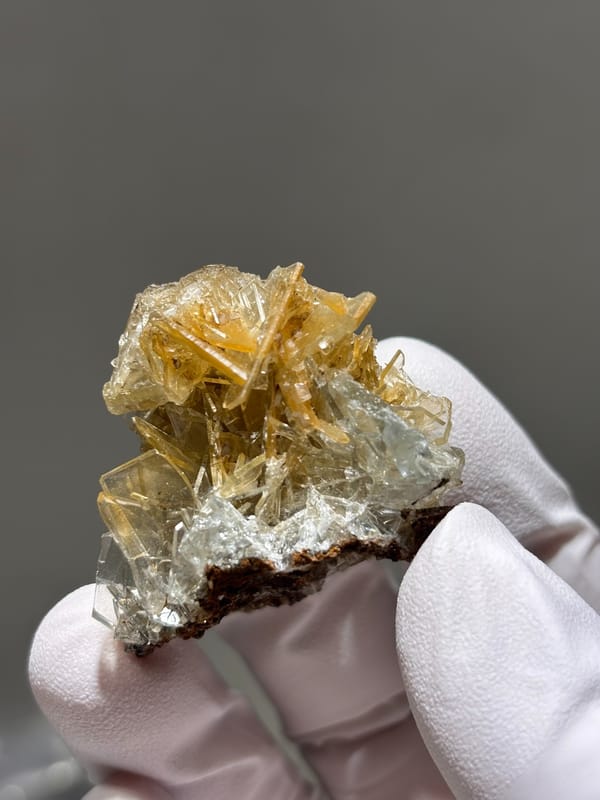 Golden-yellow baryte blades with pale blue tint from Hubei, China, second angle