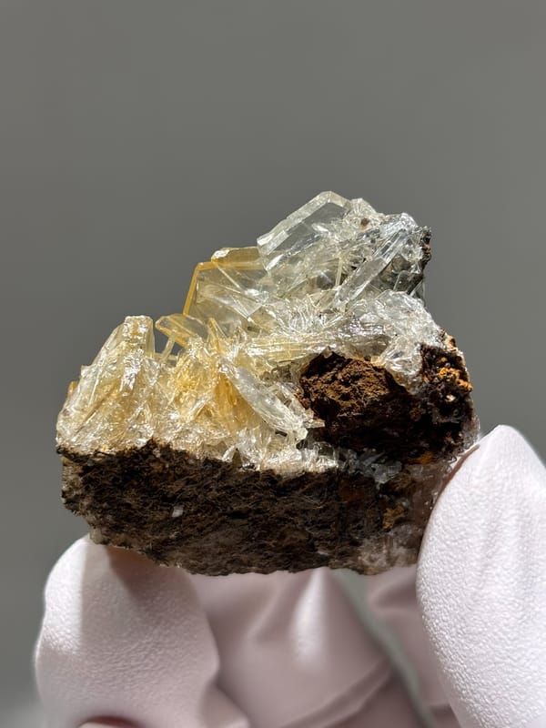 Golden-yellow baryte blades with pale blue tint from Hubei, China, reverse side